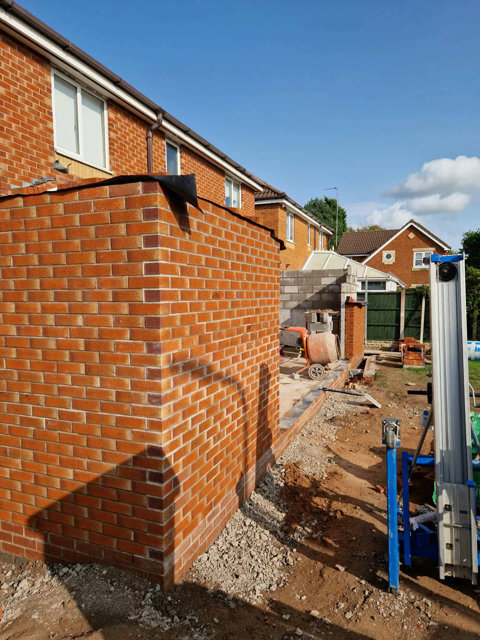 very high wall with supports